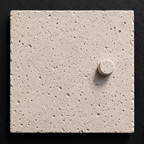 Dot concrete wall tile with minimal raised dot relief