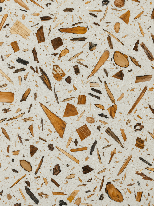 Wood terrazzo surface close-up, reclaimed timber offcuts set in concrete matrix